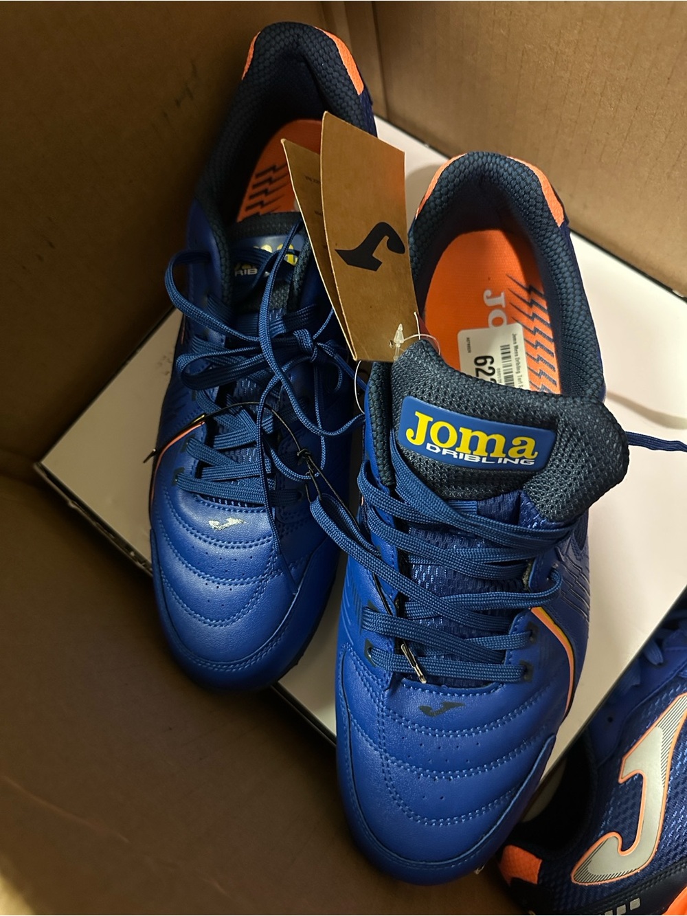 Joma Dribling Blue Soccer Shoes with Orange Accents